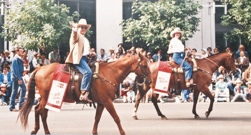 Former Alberta premier Ralph Klein, left, and his wife Colleen rode Pete and Beaver for seven years in the Calgary Stampede parade. The horses were provided by Darrel