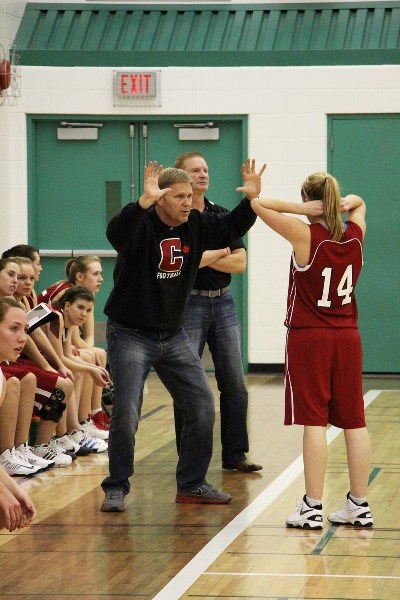 Cochrane High School Cobras coach Rob McNab salutes his team. “;Congratulations, you get to play another week,”he&#8217;d tell his players as they advanced through the