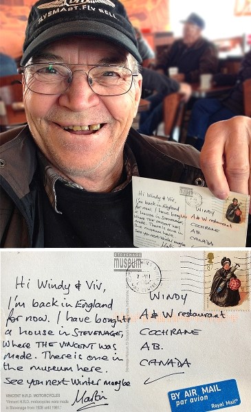 Windy Erhardt holds a vaguely-addressed postcard from a friend in England that he received at his usual table at Cochrane A&#038;W.