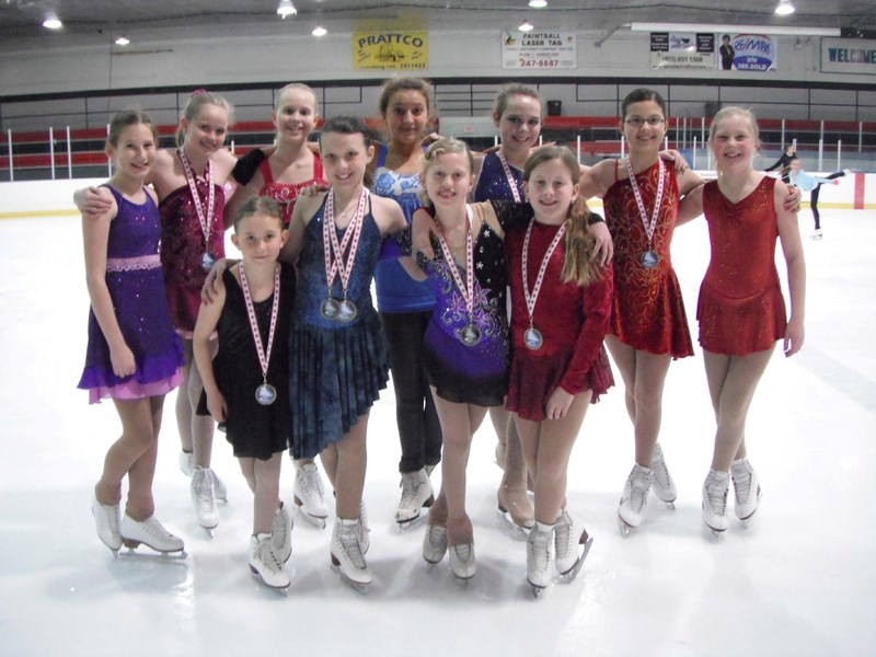 Members of the Cochrane Skating Club took home medals from the Chinook Open Figure Skating Competition April 5-7 in Lethbridge. (Back, from left): Morissa Lloyd, Paige