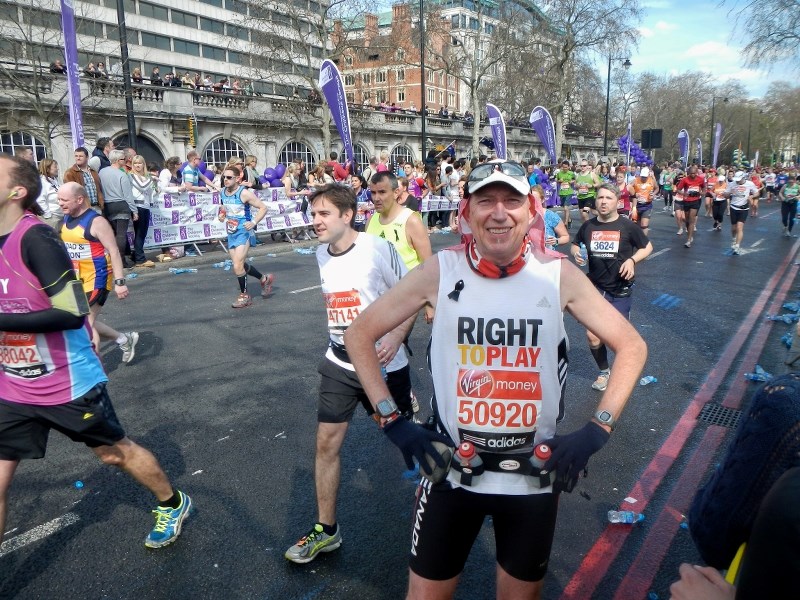 Marathon participants approach the London Bridge April 2.