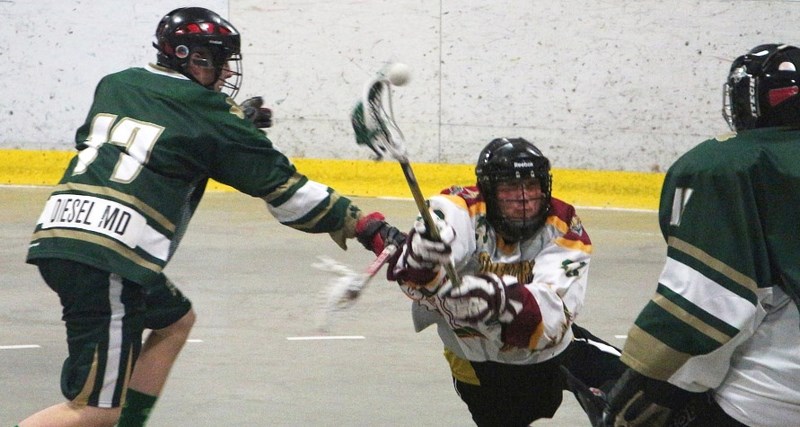 Rockyview Silvertips&#8217; Bryce Sweetman&#8217;s diving shot, while being checked by Calgary Shamrocks&#8217; Garret McConkey, was good for a goal in Rocky Mountain