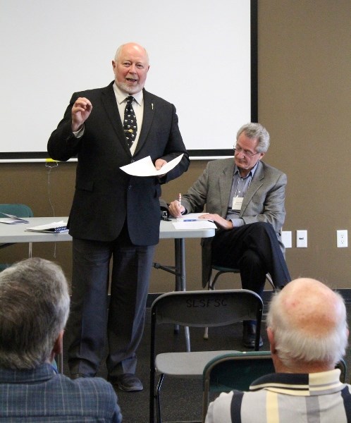 Banff-Cochrane MLA Ron Casey speak to members of Seniors on the Bow May 1.