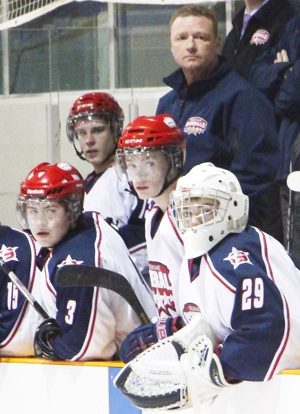 Cochrane Generals head coach Ken Soloski monitors the proceedings during Heritage Junior Hockey League playoff play against Strathmore in February. Soloski was released by