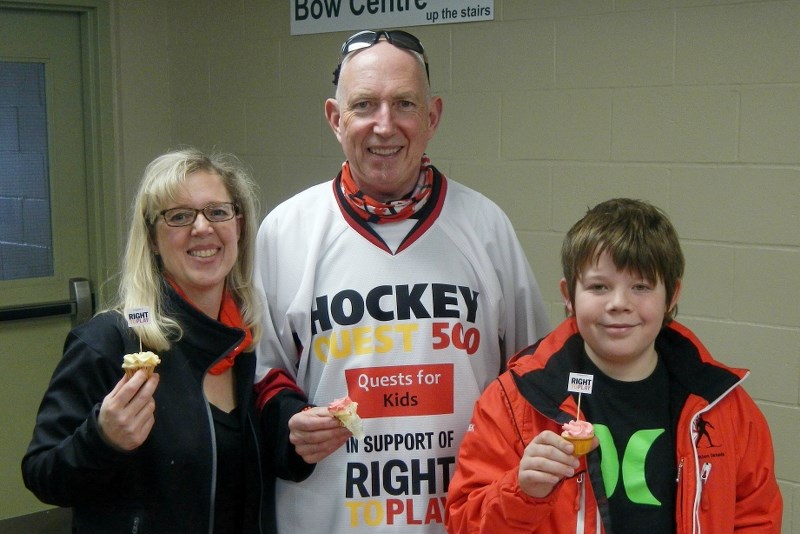 Glenda Zamzow, Martin and Derek Zamzow enjoying a cupcake after participating in Hockey Quest 500.