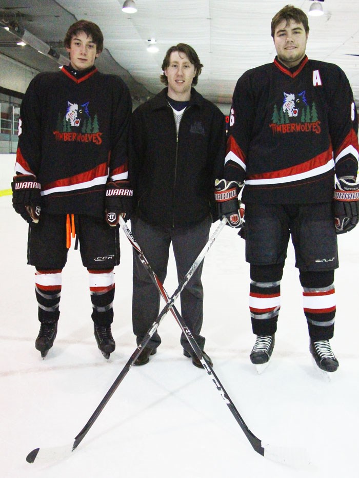 New Cochrane Generals head coach Evan McFeeters is flanked by 2013 Timberwolves Midget all-stars Brett Berndt (left) and Mac Niewchas. The former Midget head coach was named