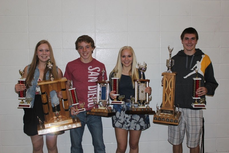 Cochrane High School Cobras athlete award winners (from left): Kristen McNab, Aidan McKeage, Mikaela McNab and Kyle Moortgat.