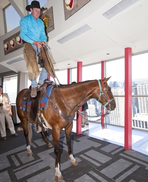 David Cowley of Rafter Six Ranch Resort has visited the Calgary Tower&#8217;s observation deck with various horses for the past 15 years.