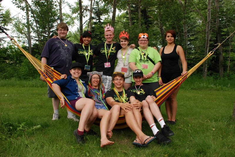 Camp fYrefly campers and youth leaders pose together on Day 2 of the Calgary leg of the leadership camp. The camp ran July 11-14 at Cochrane&#8217;s Camp Jubilee. From left: