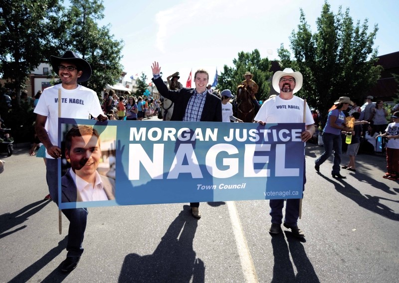 Morgan Nagel, a town council hopeful, showed his community spirit at the Labour Day Parade.