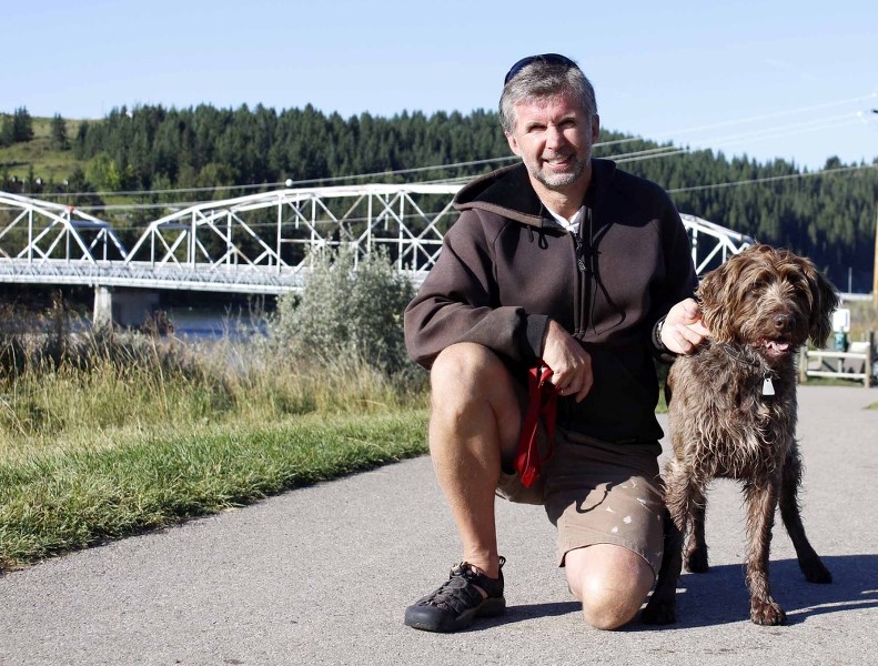Jim Uffelmann, with his dog Lulu, will run for council this October.