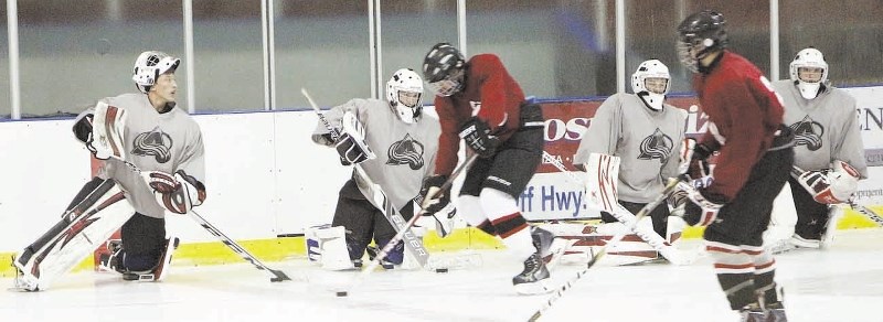 AC (Airdrie-Cochrane Avalanche players warm up prior to a training camp session Sept. 8 at Cochrane Arena. The defending Sutter Cup champs are auditioning players born in