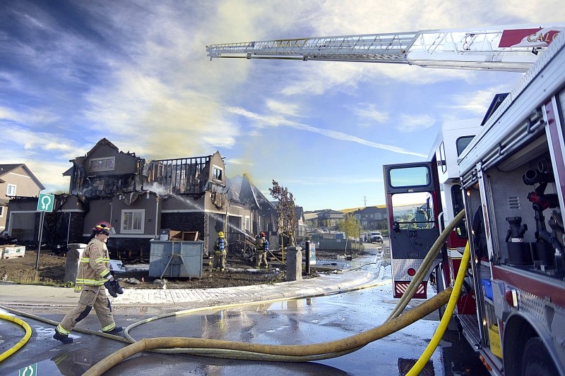 A newly built home burned to a smoldering wreck in the 200 block of Waterside Court, Bearspaw, Sept. 20. Fire services from Springbank, Cochrane, Calgary and lead