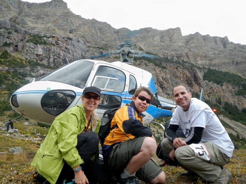Glenda, Derek and Richard Zamzow get dropped of at the Lake of the Falls ready to run / scramble down the 21kms back to the Cline River Heliport during the TransRockies