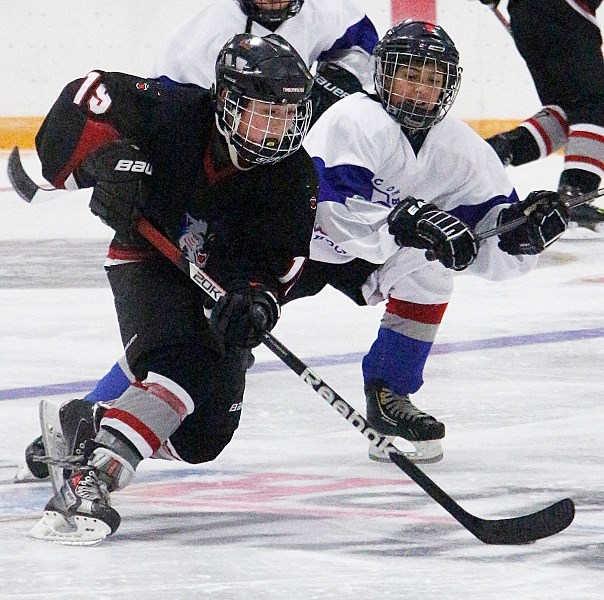 Bow Valley Timberwolves&#8217; Connor Bouchard streaks down the ice with the puck in South Central Alberta Hockey League peewee AA play against Lacombe Rockets Oct. 6 at