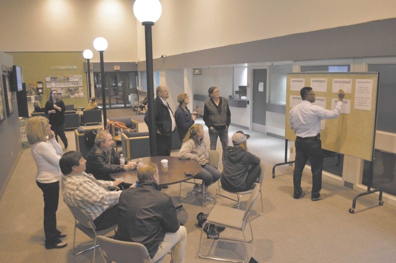 Some of the Rocky View County election candidates and their families watched as voting results were listed at the county office, which was the election headquarters, Oct. 21. 
