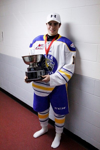 Cochrane&#8217;s Dillon Dube clutches the U16 Western Challenge Cup after Team Alberta won the trophy with a 4-2 over Team BC in the Nov. 3 tournament final in Calgary.
