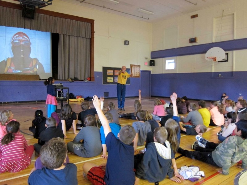 Martin talks to students about Right To Play at Queen Charlotte school in Charlottetown, P.E.I. A total of ten schools were visited in five days.