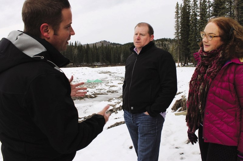 Rocky View County Capital Projects Team Lead Jorie McKenzie (left), Kyle Fawcett, Associate Minister for Recovery and Reconstruction of Southern Alberta, and Division 1 Coun. 