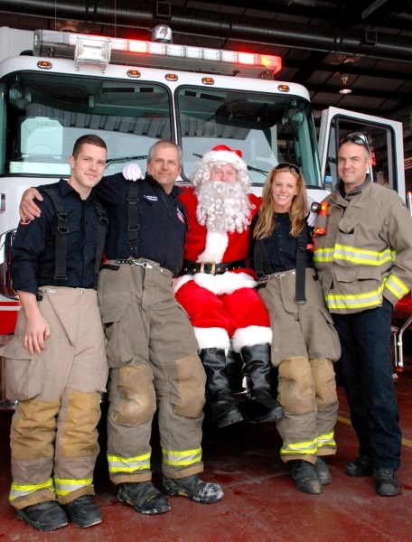 Santa visited with members of the Cochrane Fire Fighters Community Foundation earlier this week to plan out his Christmas Eve tour of Cochrane&#8217;s neighbourhood. From