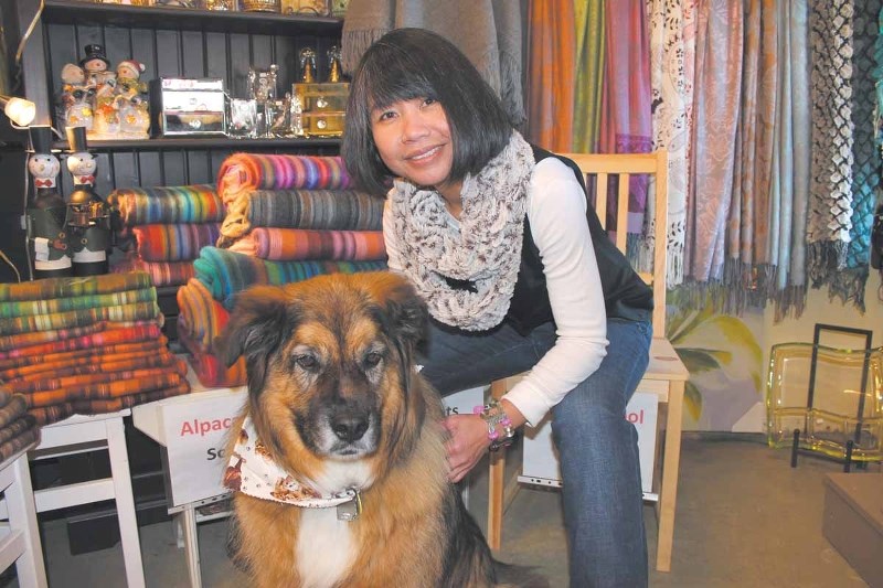 Elizabeth Fermor and her Shepherd cross Bruno are accepting donations of unopened bags of dry dog food at the Best Little Wordhouse in the West in Bragg Creek until Dec. 31