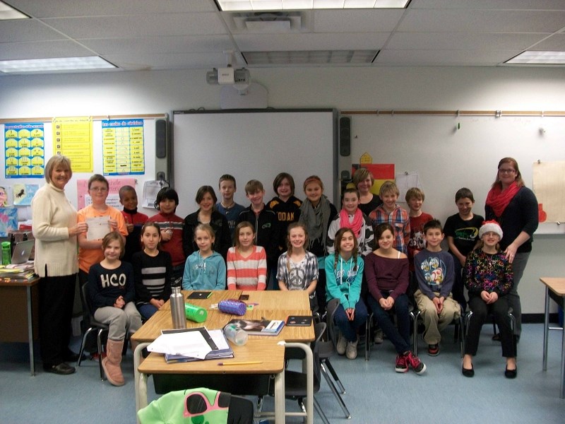 Manachaban Middle School teacher Megan Wamboldt, far right, discovered a teachable moment after her students&#8217; generous effort.