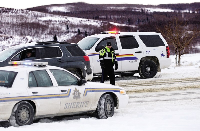 Cochrane RCMP and local sheriffs held another check stop Dec. 19 at Ghost Lake, reminding drivers to keep the phones out of their hands, remain sober while driving and