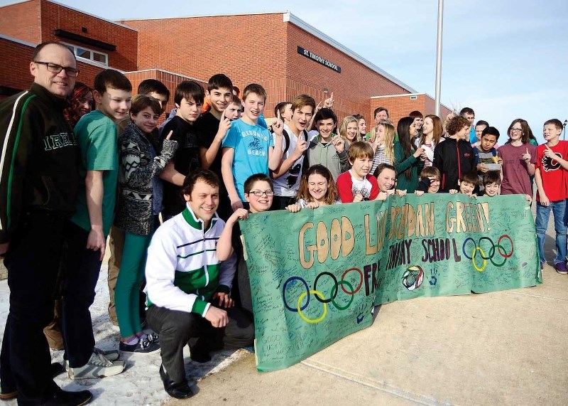 On Feb. 6 students from St. Timothy High School rallied around Brendan Green, an Olympic biathlon athlete, whose brother Alex, pictured bottom left, is a teacher at the local 