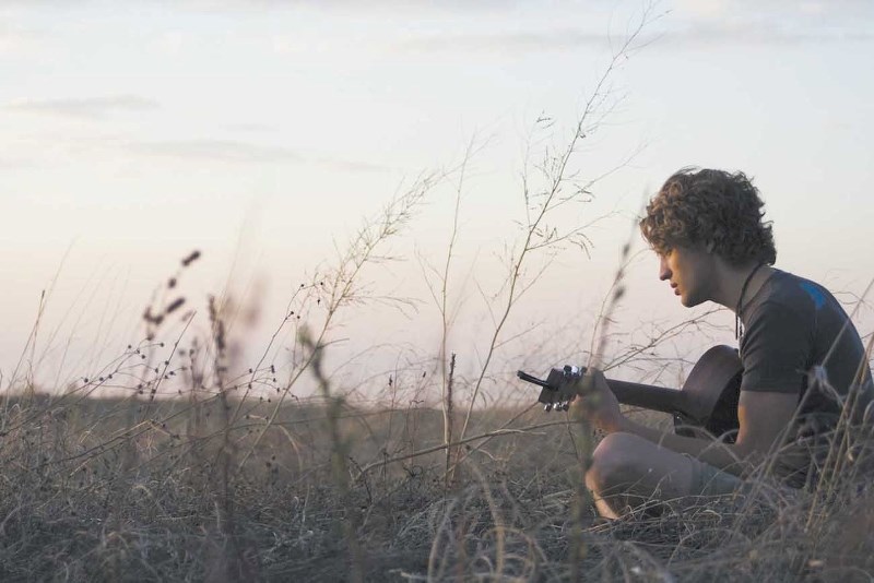 Joal Kamps, whose last album was based on his world travels, will perform at Legacy Guitar and Coffee House March 1.
