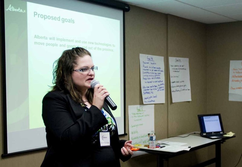 Malatest program evaluation and market research representative Bree Blottner speaks Feb. 25 at the Days Inn hotel about Alberta&#8217;s 50-year infrastructure plan.
