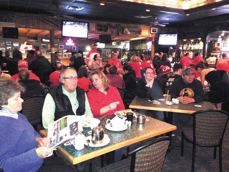 Several bars around Cochrane, including Ducks on the Roof, were packed at 5:30 a.m. with Olympic fever for the gold medal hockey game between Canada and Sweden.