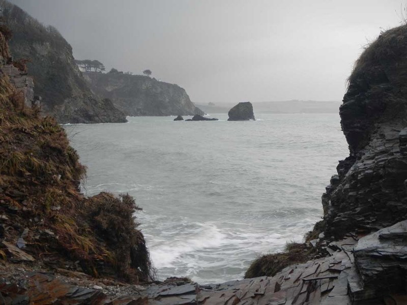 A section of the South West Coast Path along Duporth Bay, Cornwall.