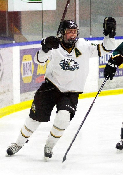 Highwood Raiders forward Gabrielle Seper celebrates her series-winning goal in Alberta Major Midget Female Hockey League playoff play against the Calgary Flyers March 1 in