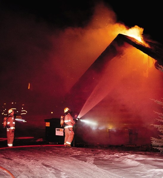 A garage fire south of Cochrane had crews from Cochrane and Rocky View County (Springbank) working late into the night March 7.