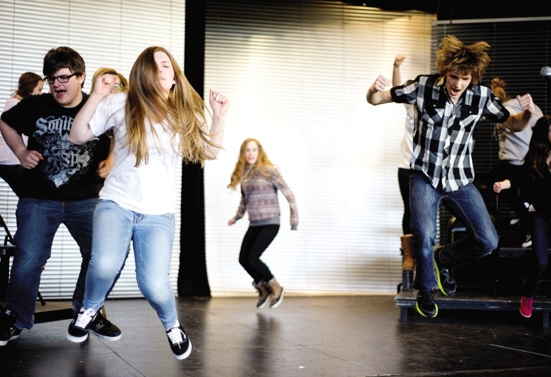 Students from Cochrane High School practice their play, &#8220;The 25th Annual Putnam County Spelling Bee&#8221; on March 7.
