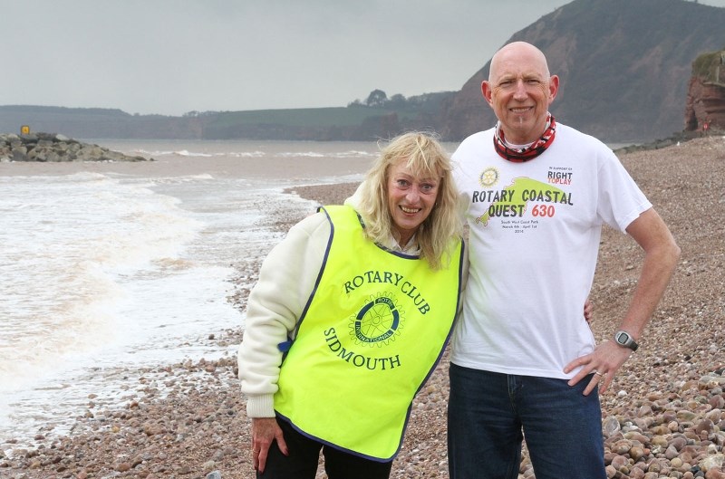 Sidmouth Rotary Club president Lynn Ellis, left, with Martin Parnell, who is currently covering the 630 mile southwest England Coastal Footpath in a series of marathons-apart 