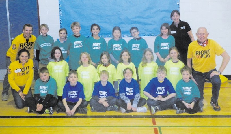 Martin Parnell, far right, with the Play Academy at Elizabeth Barrett Elementary School.