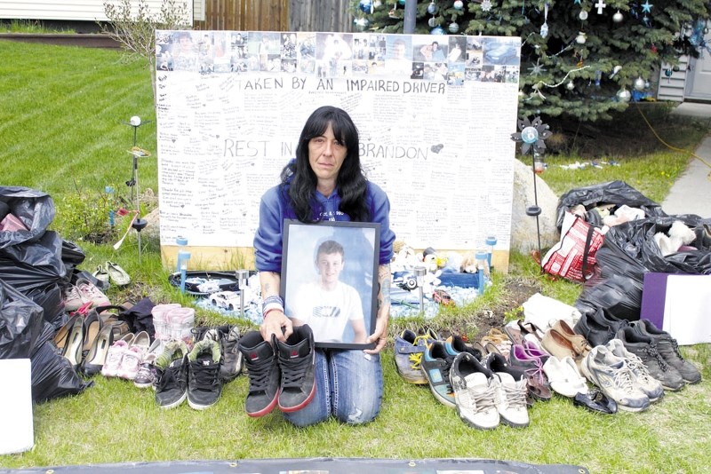 Kim Thomas continues her effort to raise attention to the perils of drunk driving through Families for Justice, collecting shoes for the &#8217;empty shoe