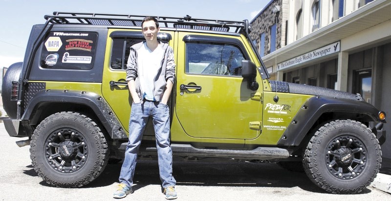 Braydon Morisseau, below, shows his new storm-equipped 2007 Jeep Wrangler Sahara, which he uses to track down storms and tornados throughout North America.
