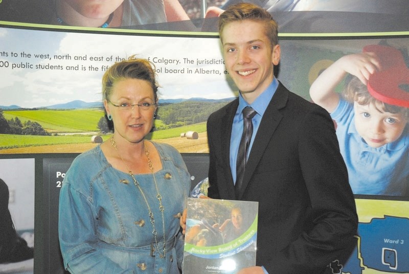 Jordan Eeles, right, recognized by RVS trustee Colleen Munro.