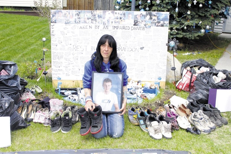 Due to the success of Kim Thomas&#8217; Empty Shoe Campaign, the Cochrane mother was forced to move the event from Calgary to Cochrane&#8217;s Mitford pond.