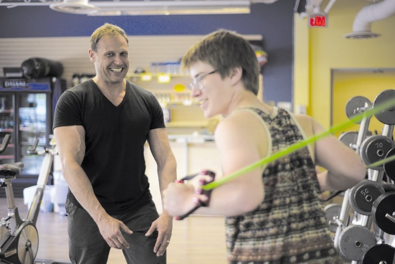 B.J. Morgan, left, of Cochrane Health and Fitness Club was named best personal trainer in the Eagle&#8217;s Best of Cochrane awards.