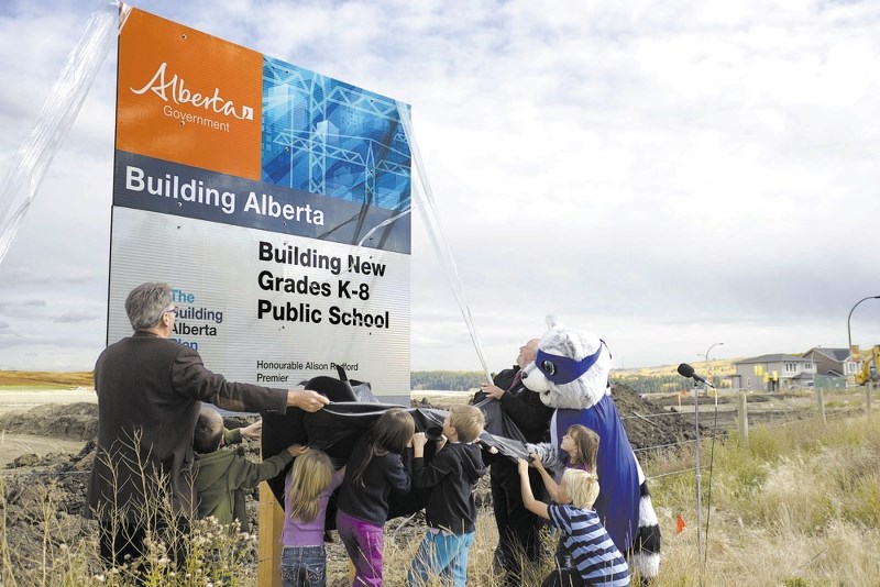 Members of Rocky View Schools, the Alberta Government and the Town of Cochrane celebrated the announcement of a new school in Sunset Ridge last October.