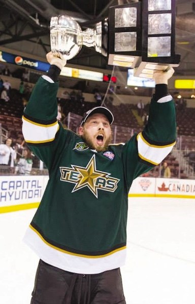 Cochrane&#8217;s Justin Dowling of Texas Stars hoists Calder Cup June 17.