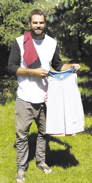 Blake Ward displays some of the clothing he has made as part of his Seed yoga collection.