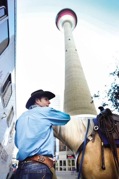 David Cowley and his five-year-old horse Tucker travelled to the top of the Calgary Tower July 5, the 16th annual time that Cowley and the Rafter Six Ranch have made the