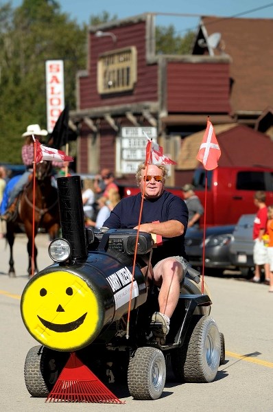 Norm Saunders drives a choo-choo train lawnmower last year during the parade that kicks off the annual Water Valley Days. This year&#8217;s event takes place Aug. 9 and Aug.