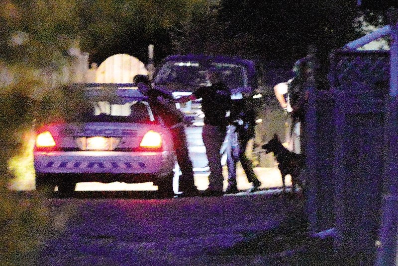 Benjamin Laslo, 26, is arrested in the alley behind a Quigley home Aug. 17.