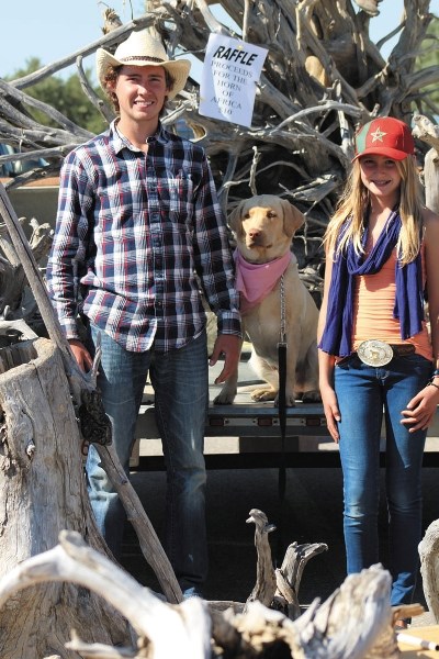 Siblings Andrew and Laura Fawcett were at the Springbank Fall Fair in 2011 with piles of British Columbia driftwood that they were selling to fundraise money for the Horn of