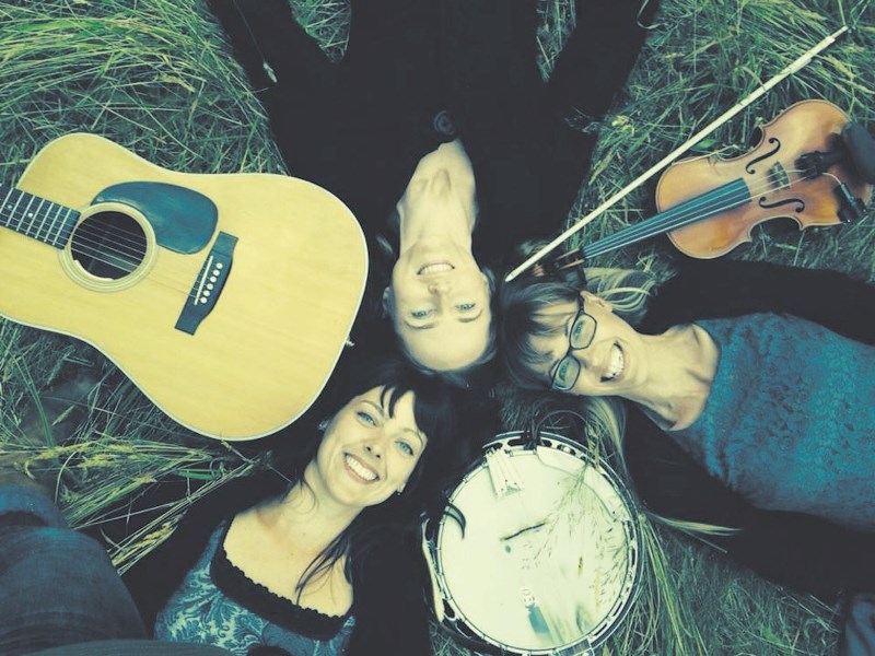 Bluegrass trio The Sweet Lowdown are made up of Shanti Bremer, Amanda Blied and Miriam Sonstenes. The band will play Legacy Guitar and Coffee House Sept. 13.